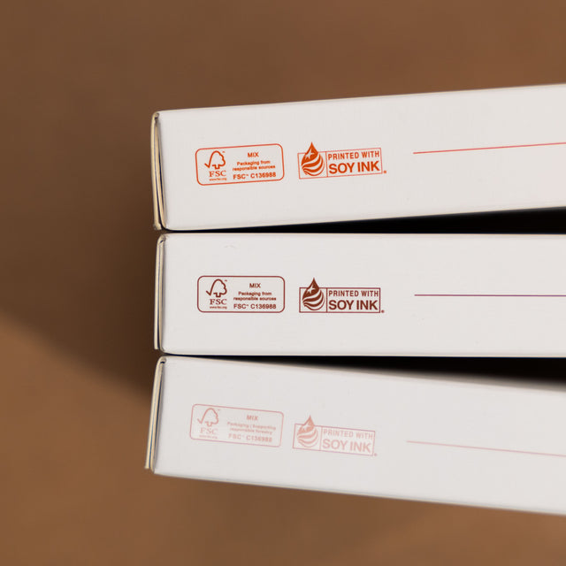 Three stacked Satechi boxes showing FSC Mix and Printed with Soy Ink labels on the packaging.