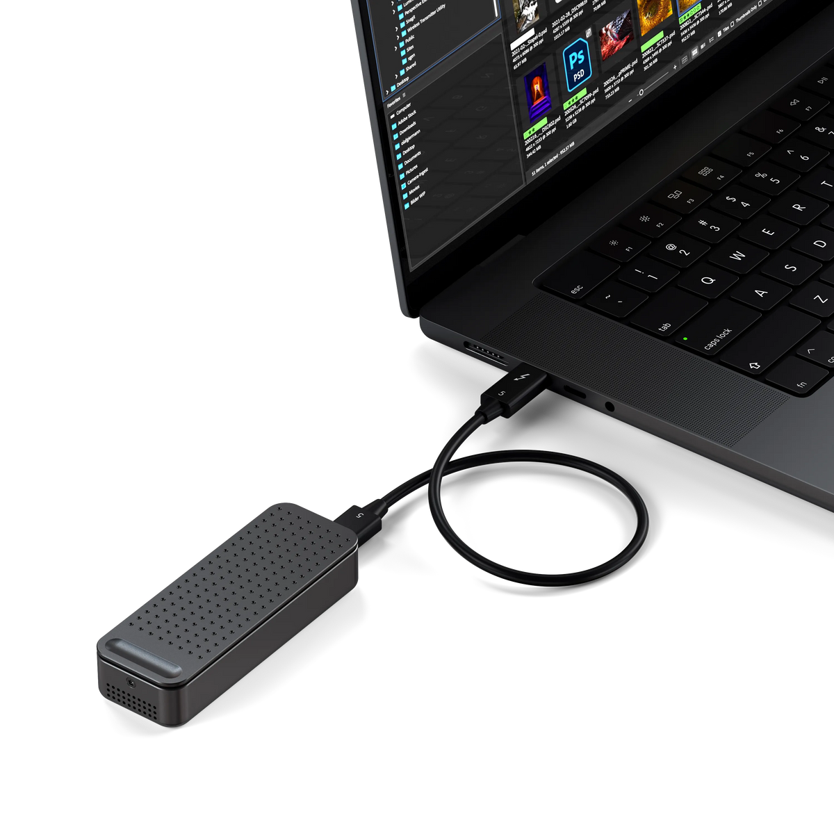 DotDisk 80Gbps SSD Enclosure in Space Black connected to a laptop