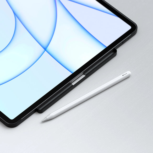 Satechi Vegan Leather Magnetic Case for iPad Pro in black, showing its Apple Pencil holder slot, with an Apple Pencil beside the iPad.