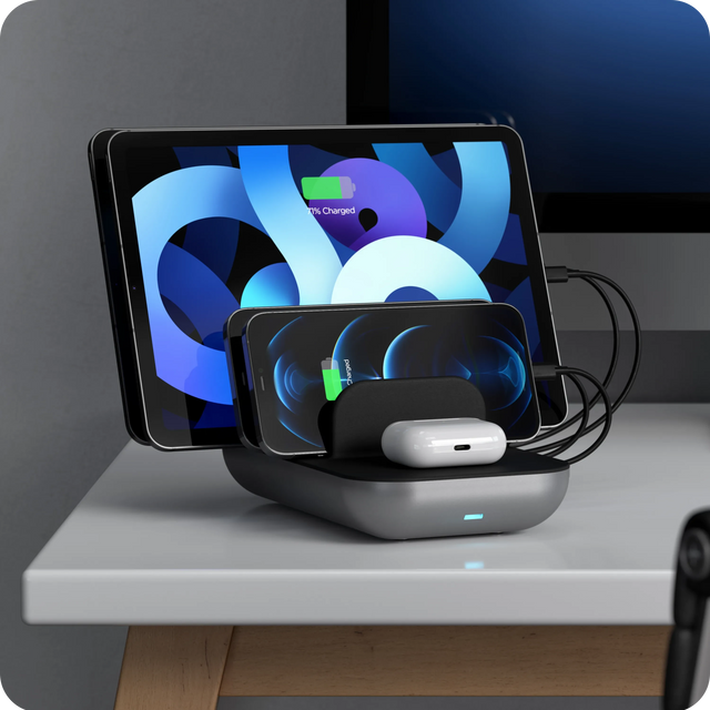 The Satechi Dock5 Multi-Device Charging Station charging with iPhone, AirPods, and iPad. 