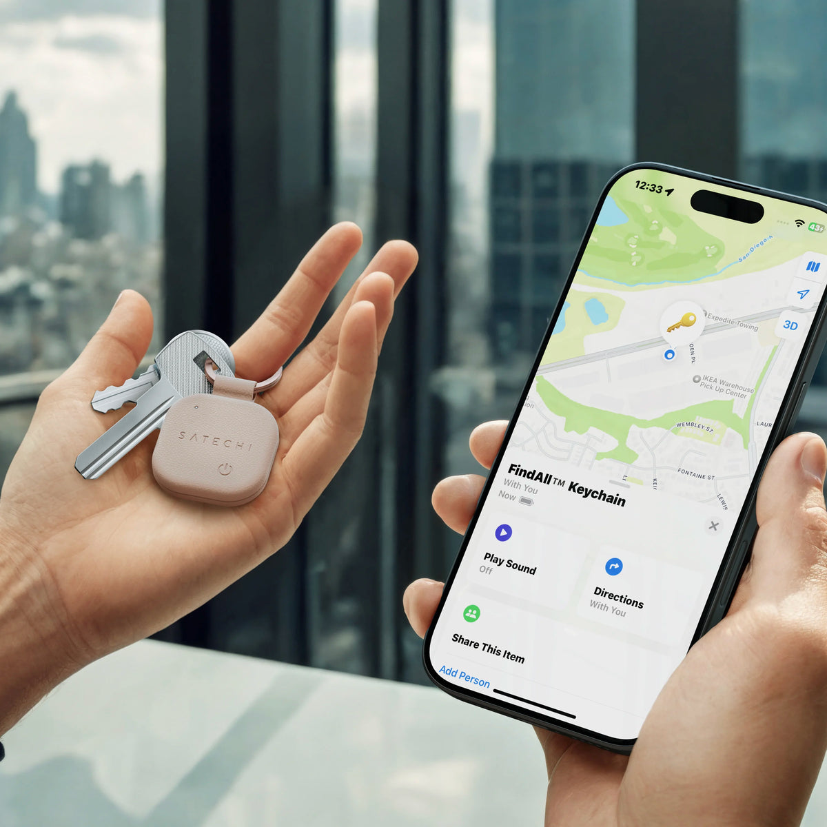 Hand holding keys with a Satechi Vegan-Leather FindAll Keychain in Desert Rose, next to an iPhone showing it in the Find My app