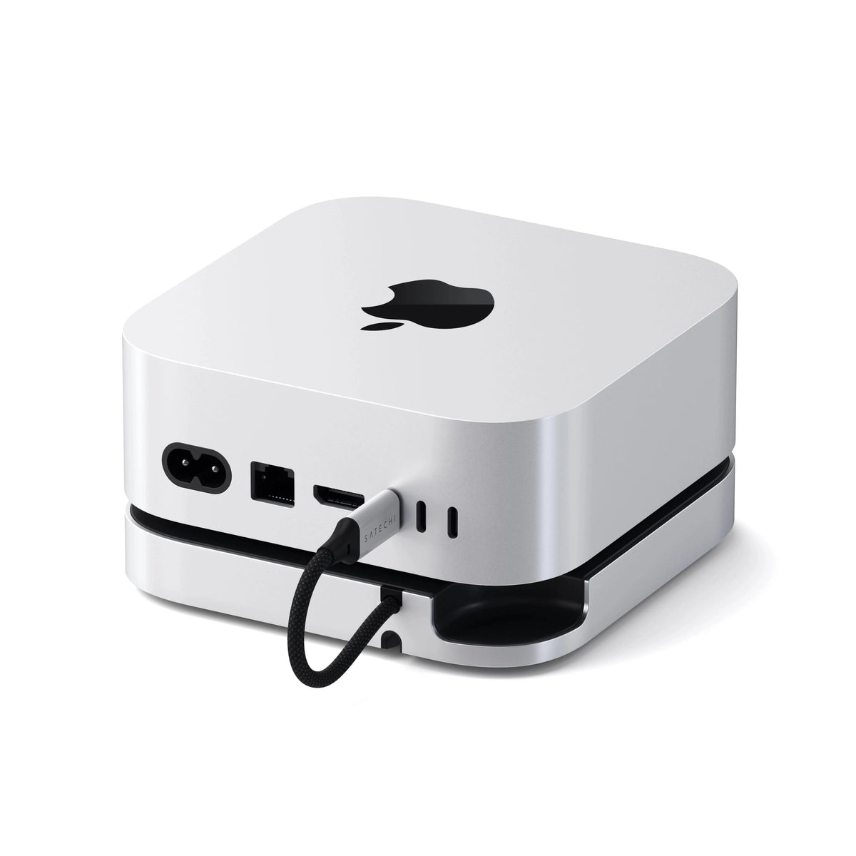 Mac Mini M6/M5 Pro/M4 Stand & Hub with SSD Enclosure under a Mac mini, back view with USB-C cable connected