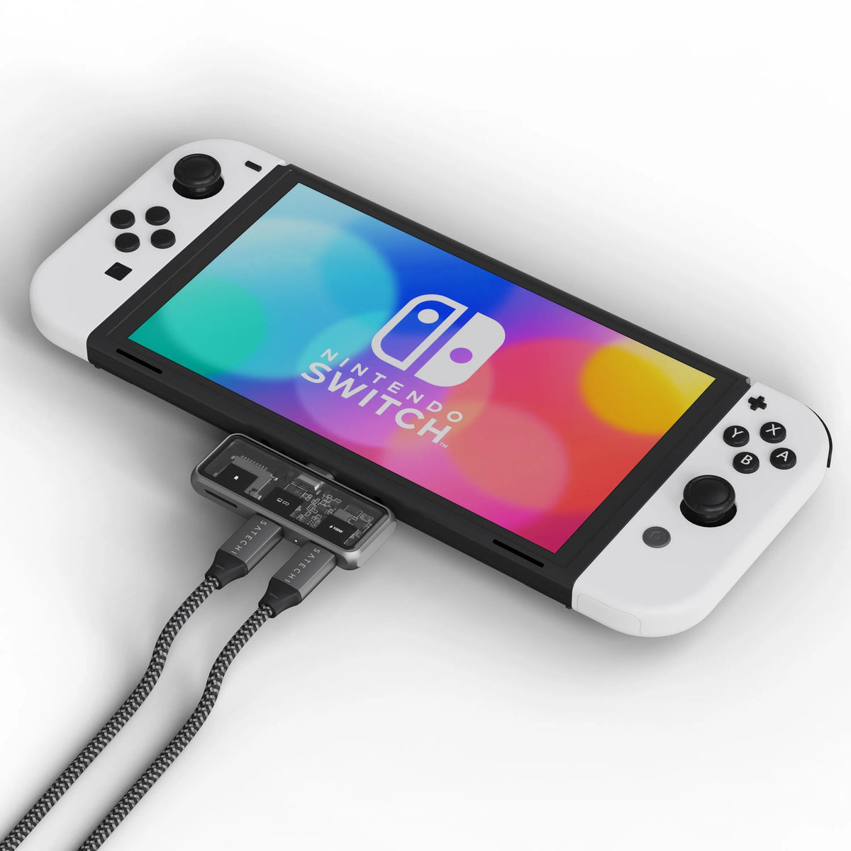 Mobile XR Hub with microSD Reader plugged into a Nintendo Switch, with two braided USB-C cables