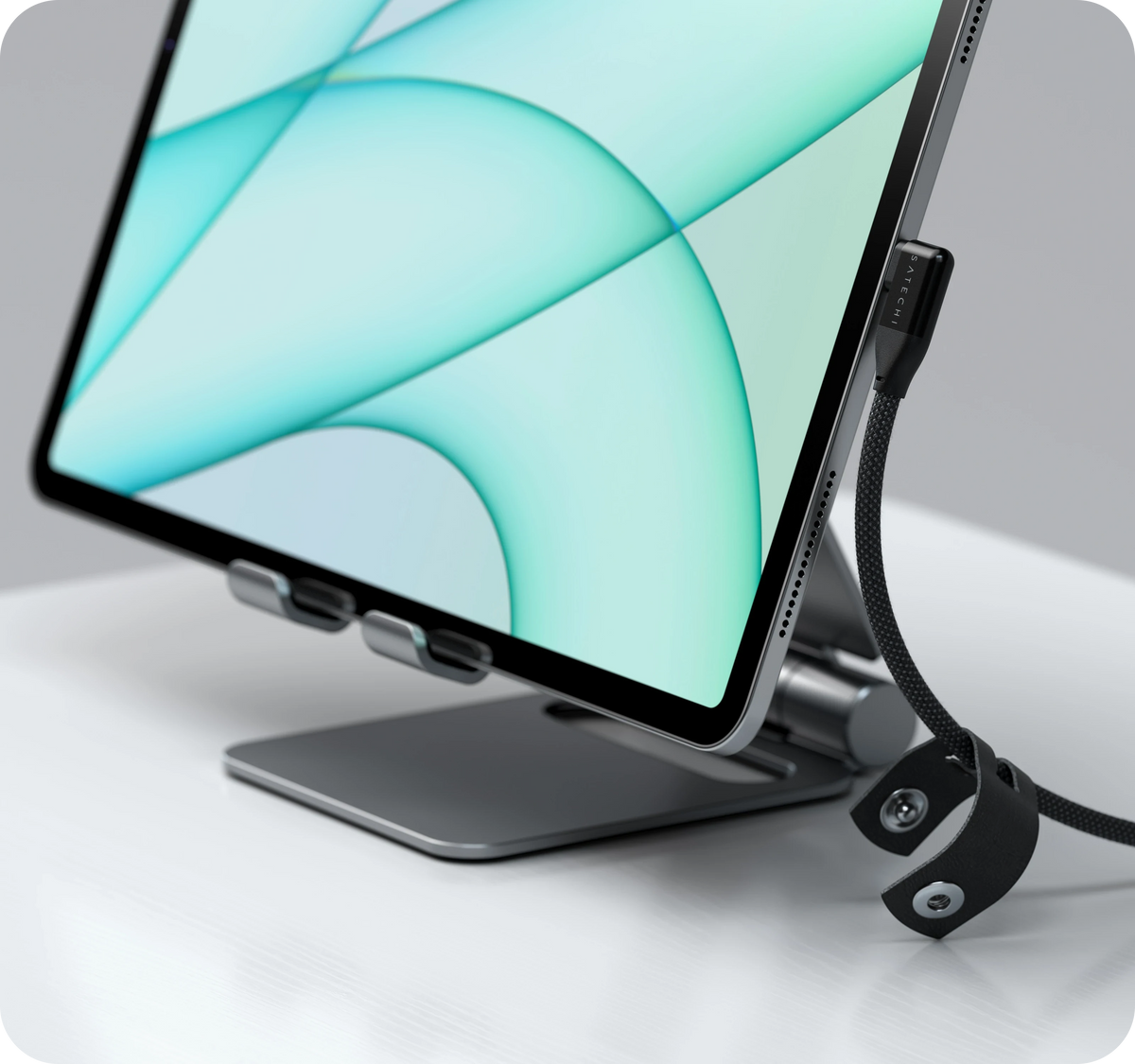 Right-Angle USB-C cable plugged into an iPad on a stand, routed flat along the side