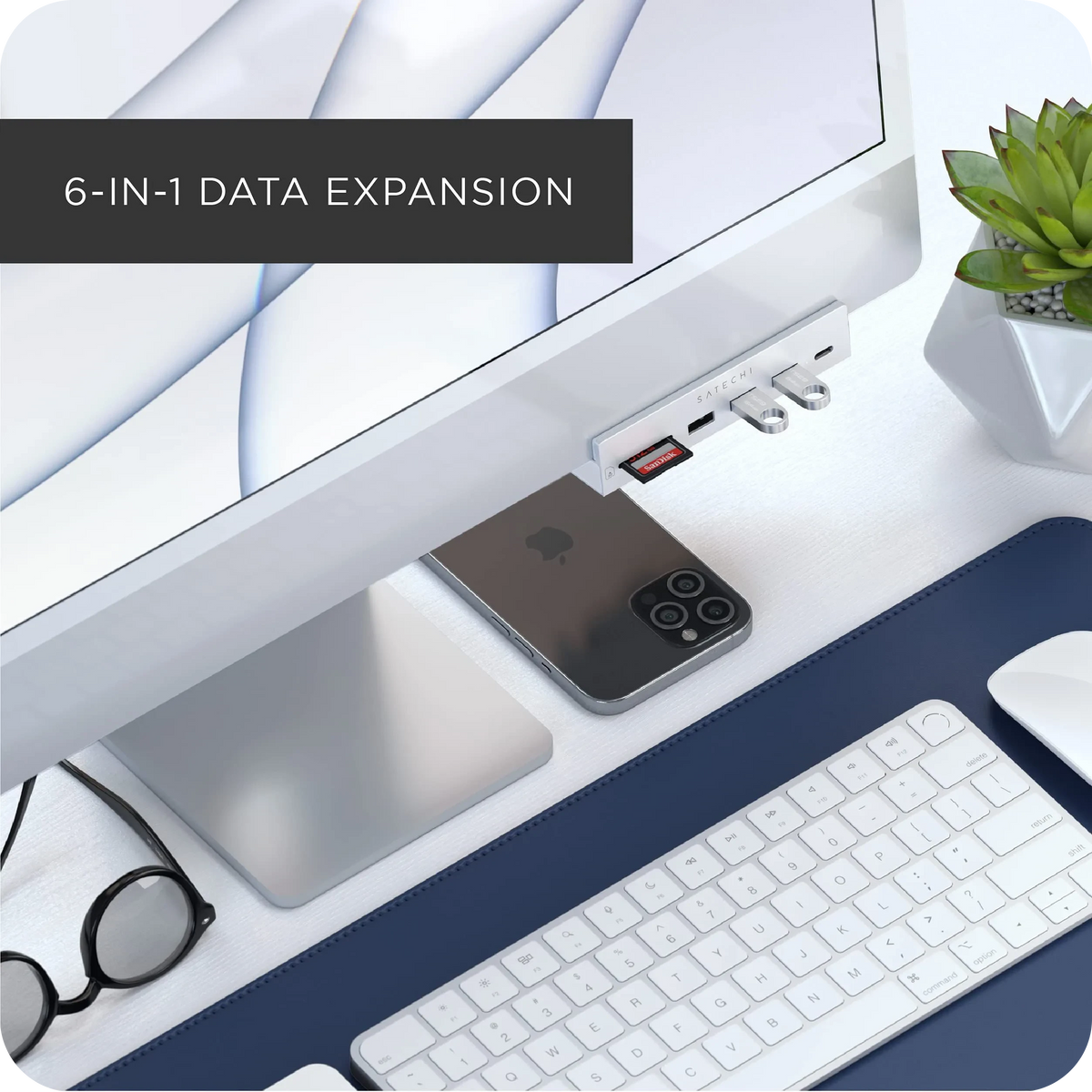 USB-C Clamp Hub for 24-inch iMac in Silver on an iMac with an SD card and phone nearby, with text: 6-in-1 data expansion