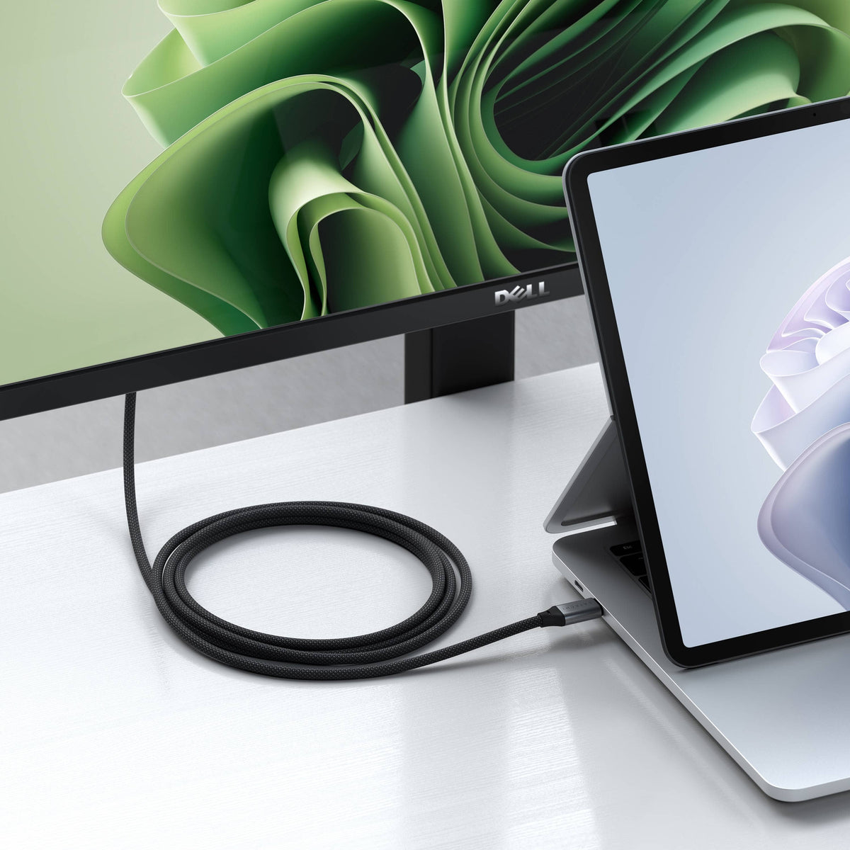 USB-C to HDMI 2.1 8K Cable connecting a Surface laptop to a Dell monitor