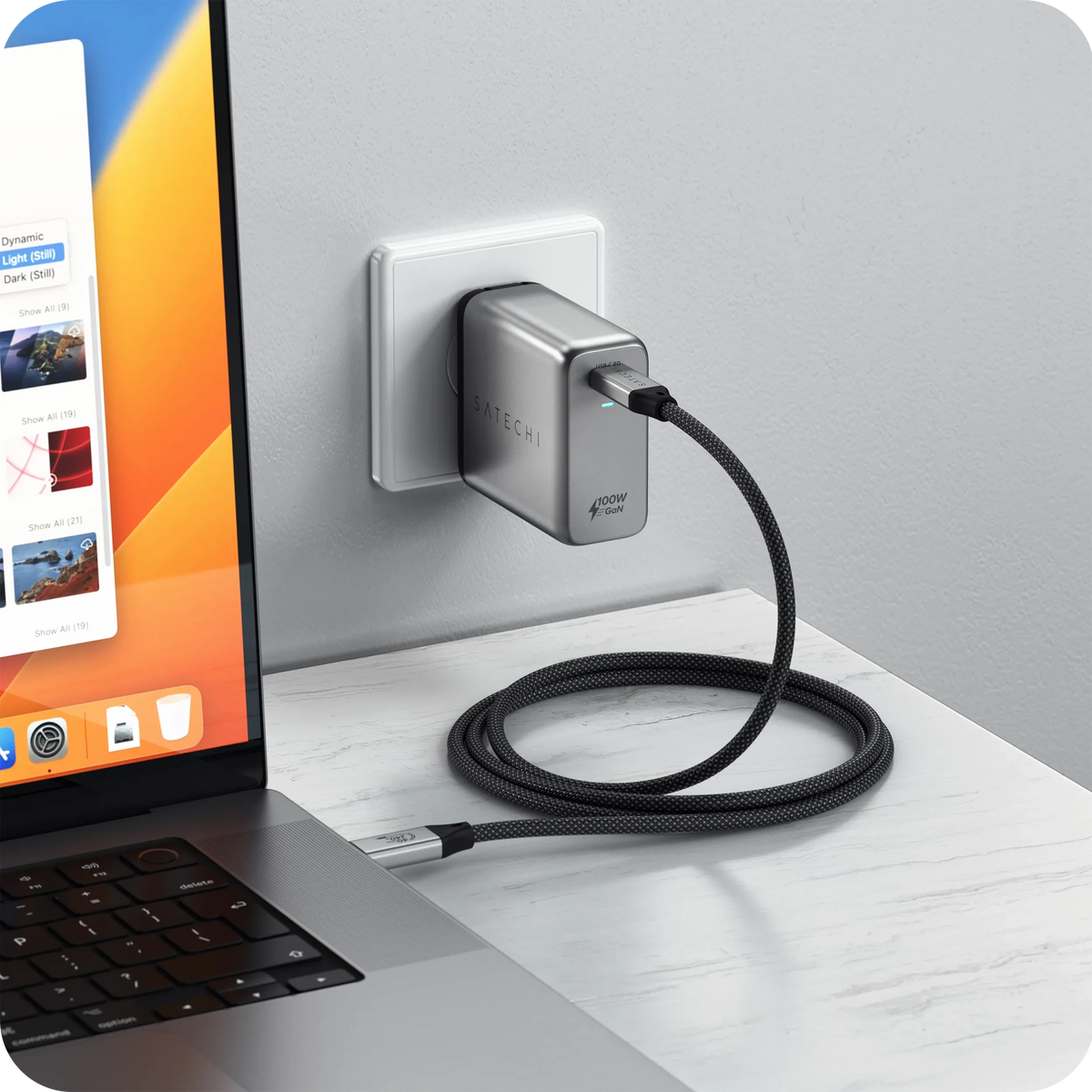 USB4 Pro Cable 1.2m connecting a wall charger to a laptop