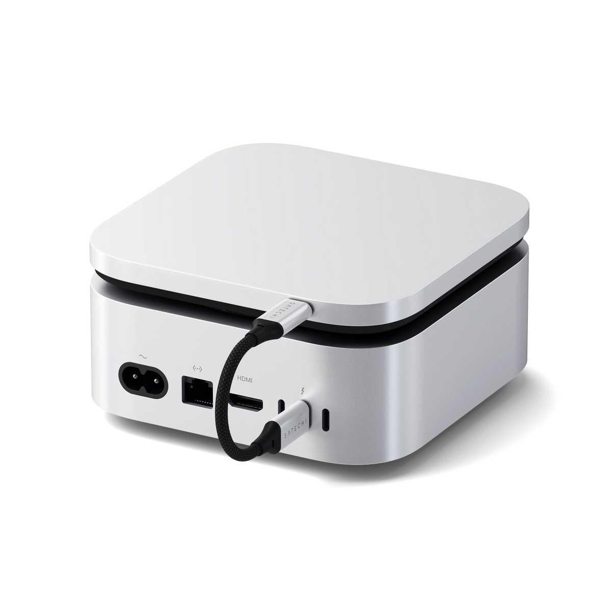 USB4 Slim NVMe SSD Enclosure under a Mac mini, back view with cable connected