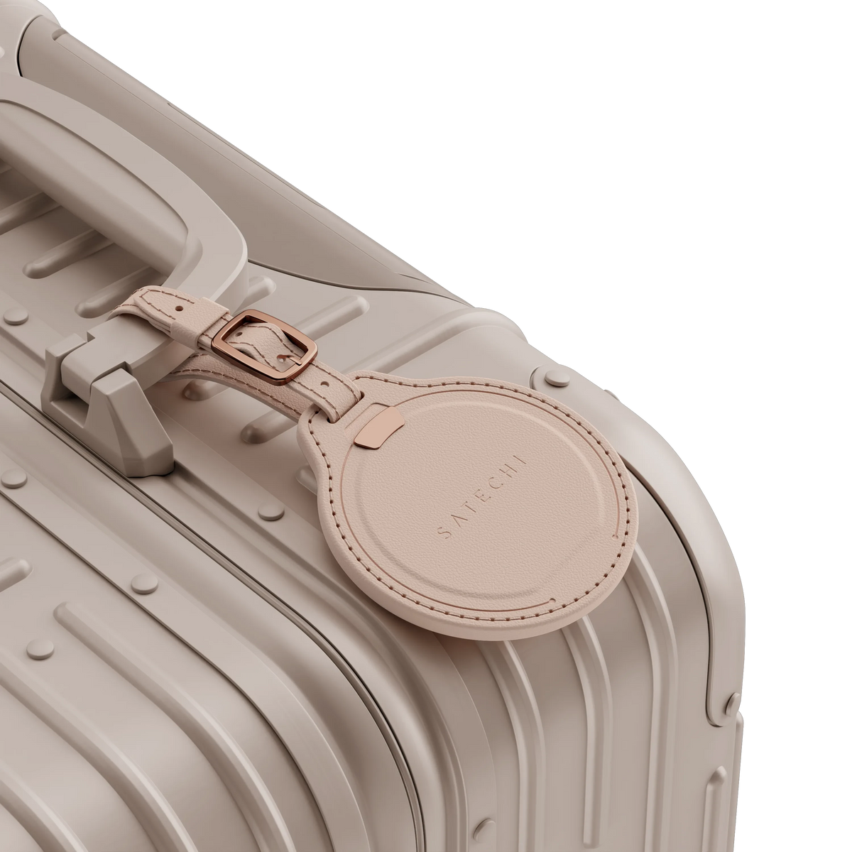 Vegan-Leather FindAll Luggage Tag in Desert Rose attached to a suitcase handle