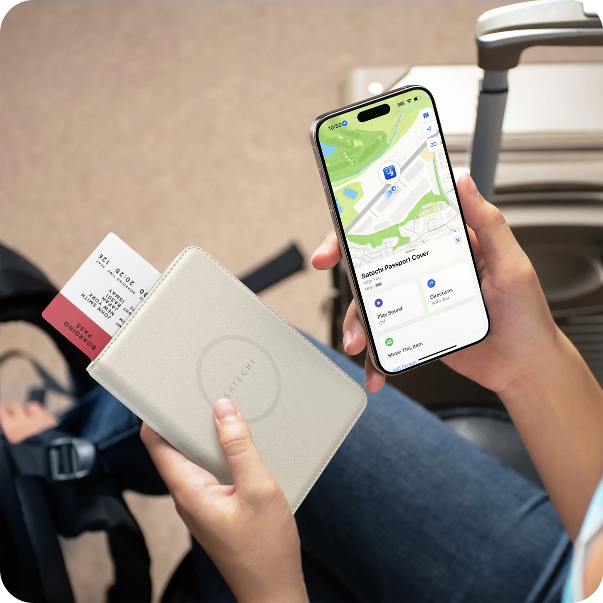 Hand holding the Vegan-Leather FindAll Passport Cover in Sand with an iPhone showing it in the Find My app