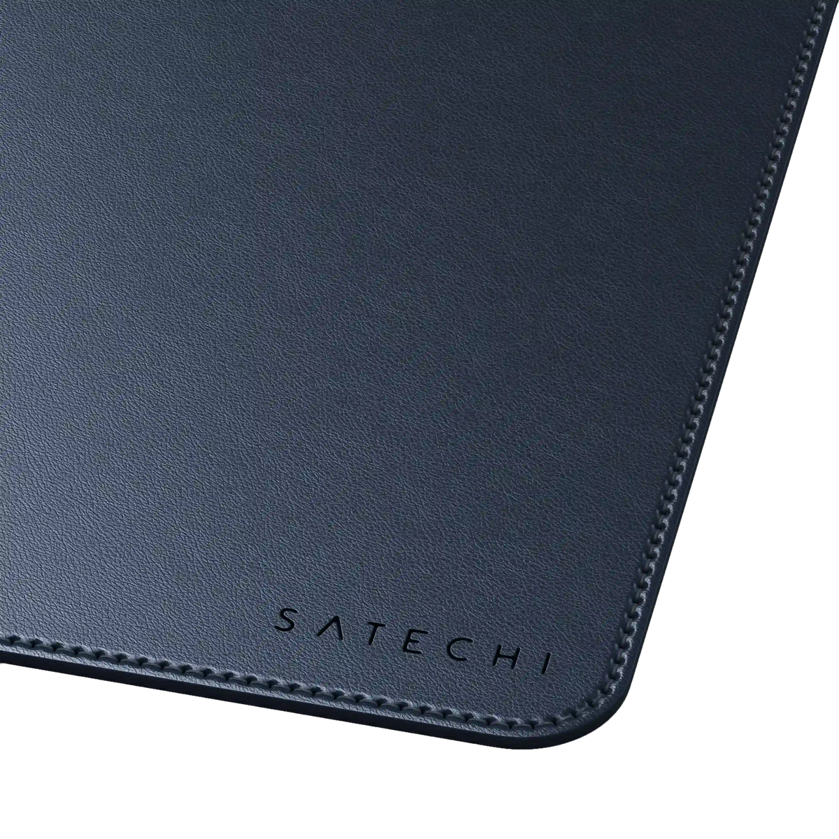 Vegan-Leather Premium Desk Mat in Blue, corner close up with Satechi logo