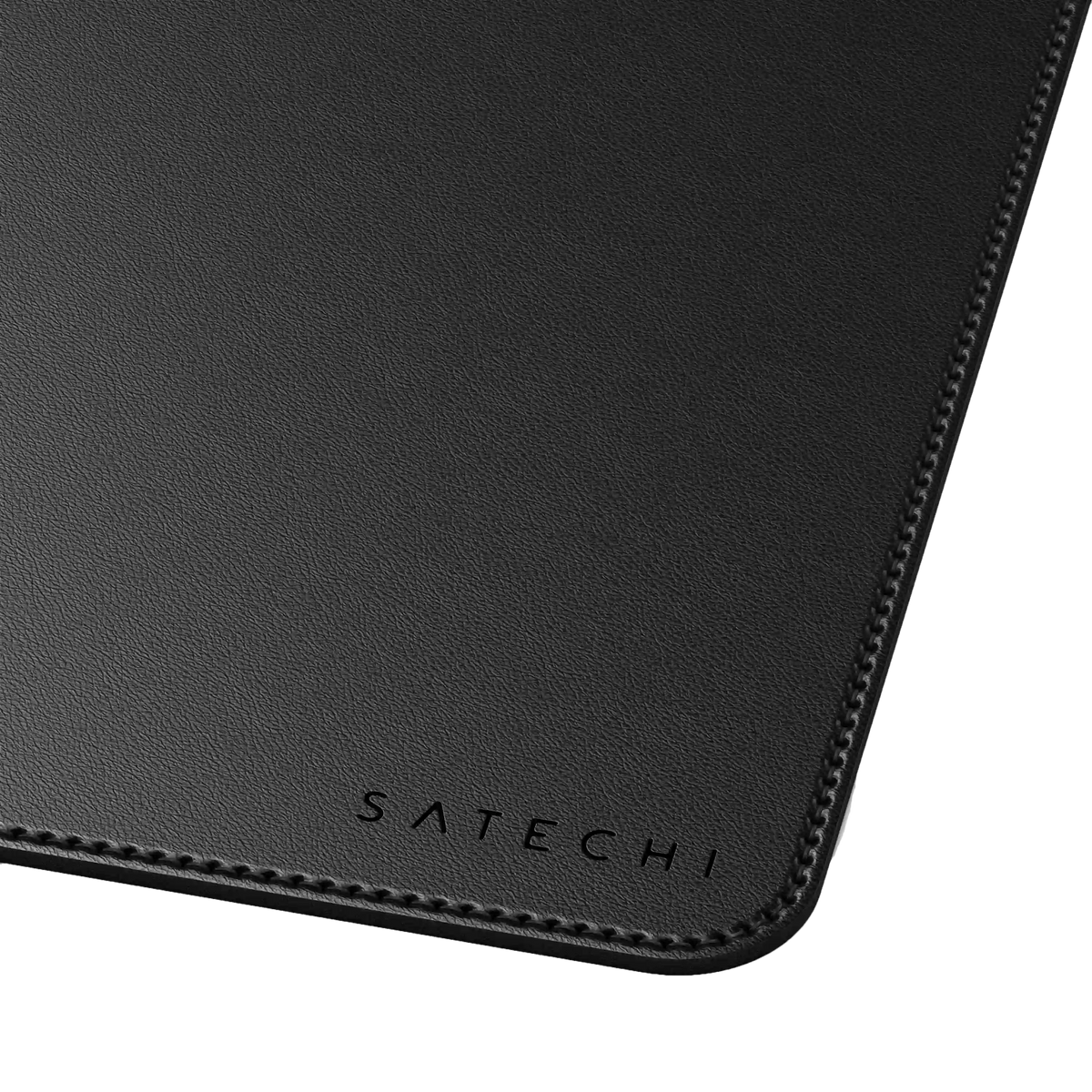 Vegan-Leather Premium Desk Mat in Black, corner close up with Satechi logo