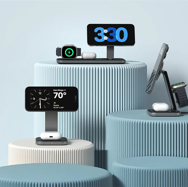 3-in-1 Foldable Qi2 Wireless Charging Stand, 2-in-1 Foldable Qi2 Wireless Charging Stand, and Qi2 Trio Wireless Charging Pad on light blue pedestals, charging iPhones in StandBy mode along with an Apple Watch and AirPods.