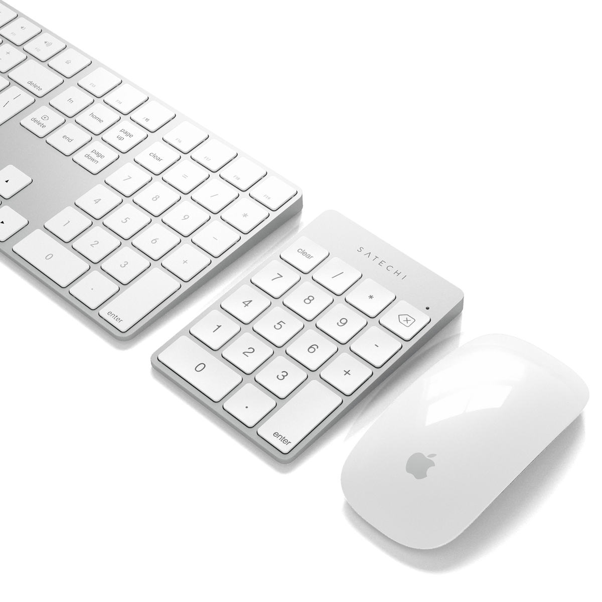 Aluminum Slim Rechargeable Bluetooth Keypad in Silver next to a keyboard and mouse