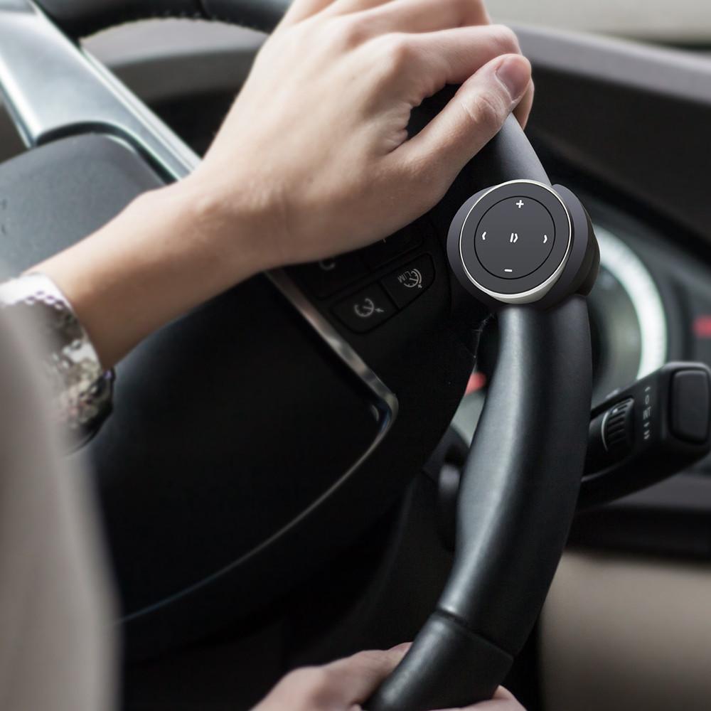 Bluetooth Media Button mounted on a car steering wheel