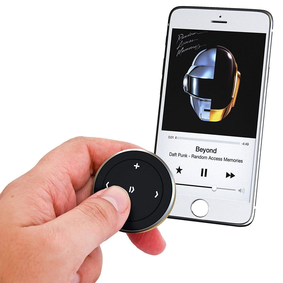 Hand holding the Bluetooth Media Button to control music playing on an iPhone