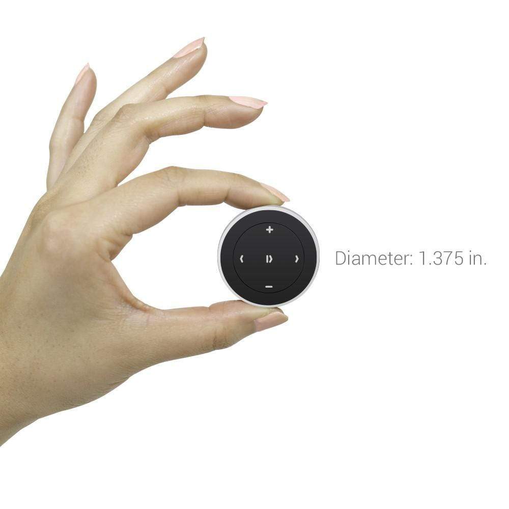 Fingers holding the Bluetooth Media Button to show its size, diameter 1.375 inches