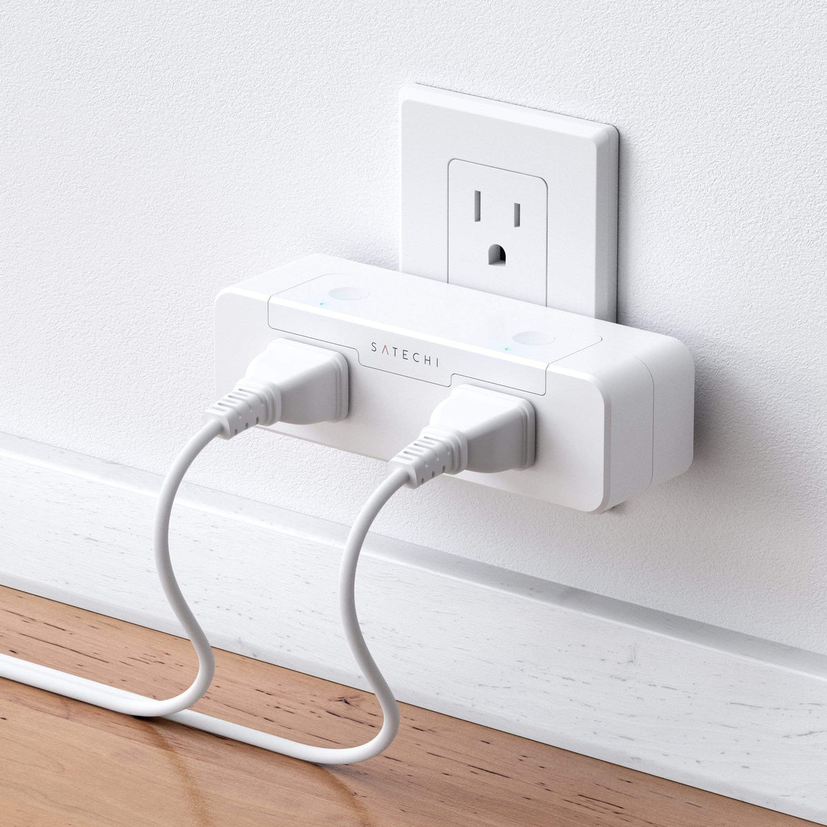 Dual Smart Outlet, US version, plugged into a wall outlet with two cords
