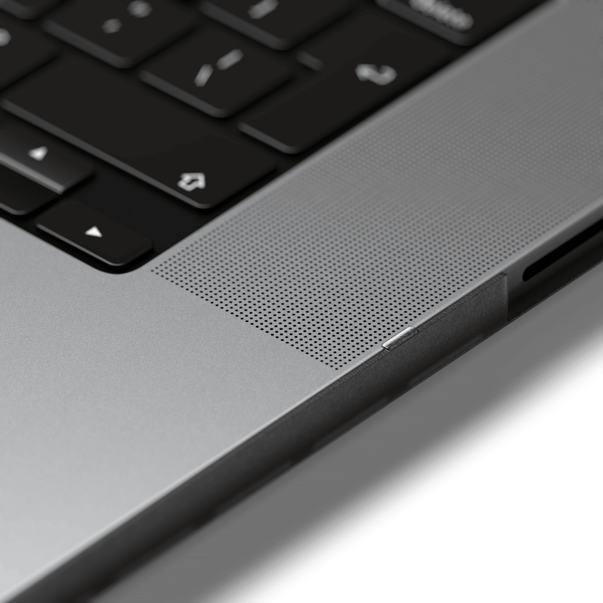 Eco-Hardshell Case for MacBook Pro 16-inch in Dark, close up of the edge next to the keyboard