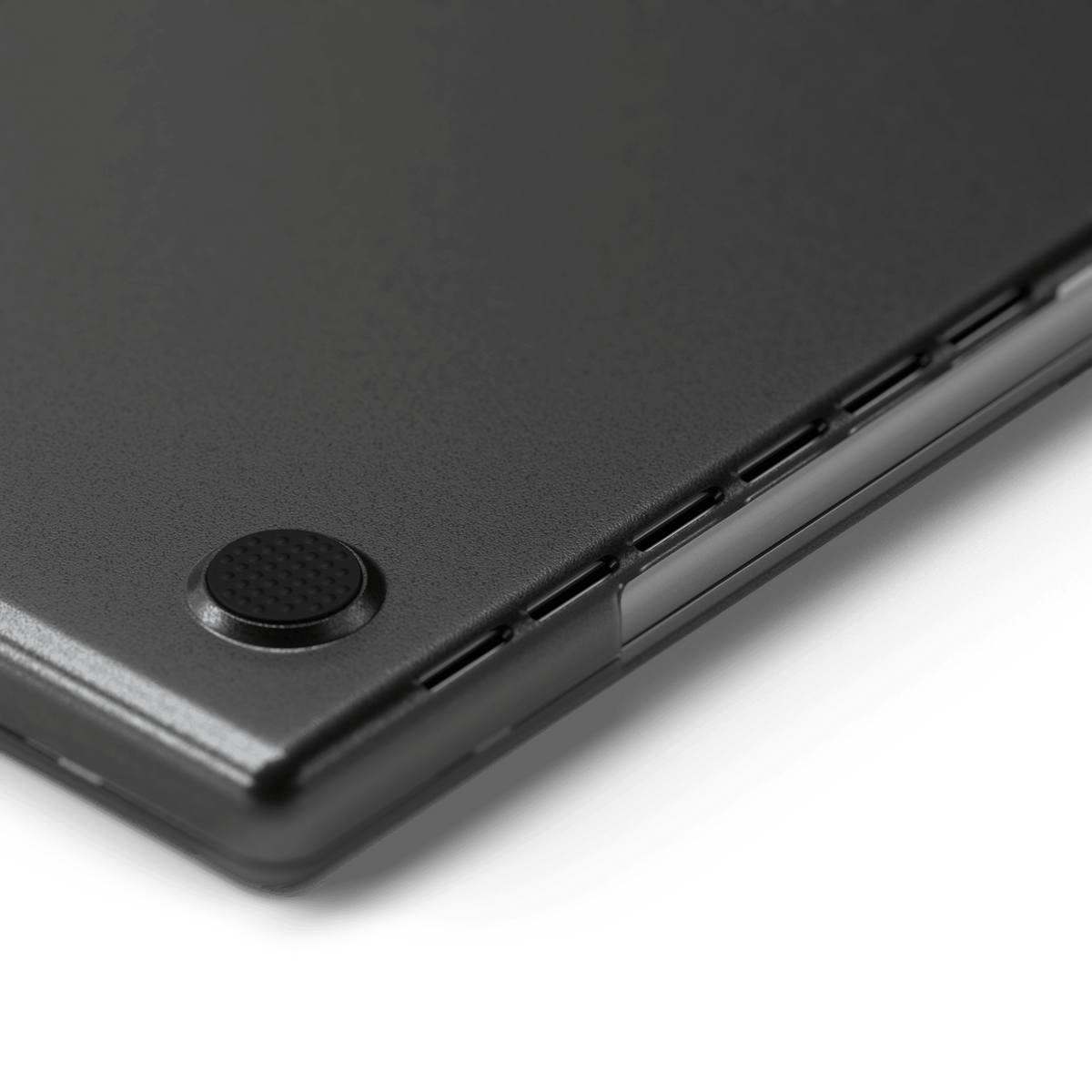 Eco-Hardshell Case for MacBook Pro 14-inch in Dark, close up of a rubber foot and vents