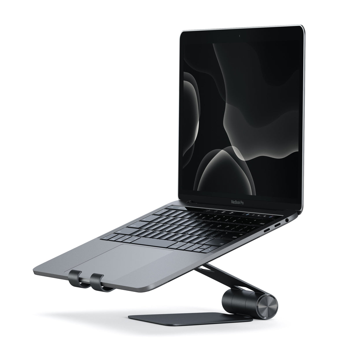 R1 Aluminum Hinge Holder Foldable Stand in Black holding a MacBook