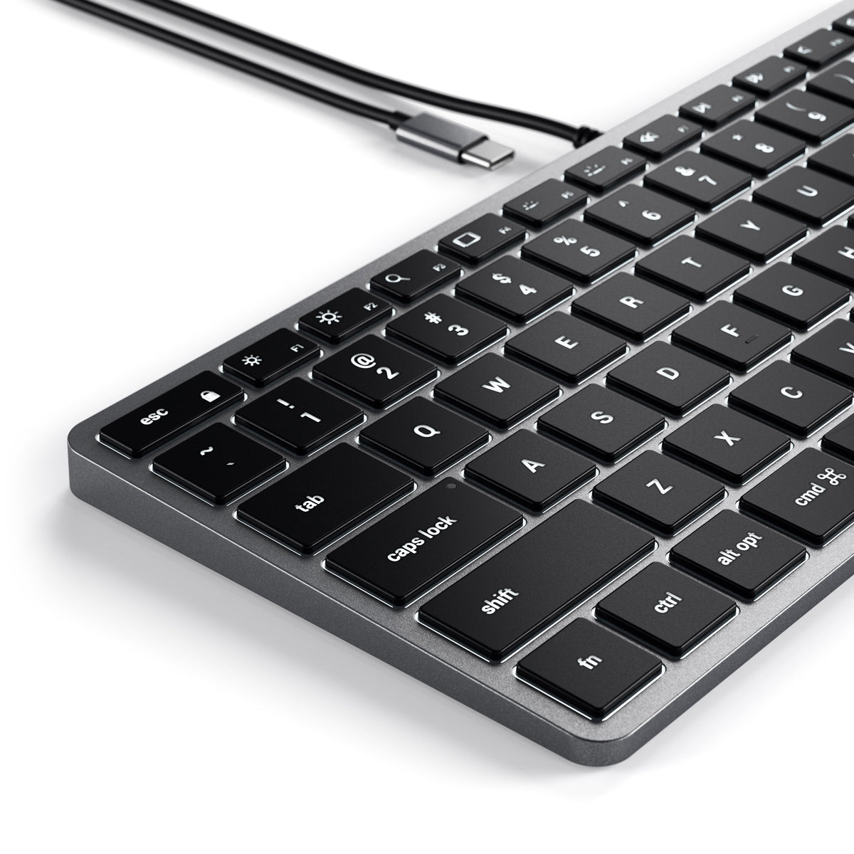 Slim W1 Wired Backlit Keyboard in Space Gray, close up of keys and USB-C cable