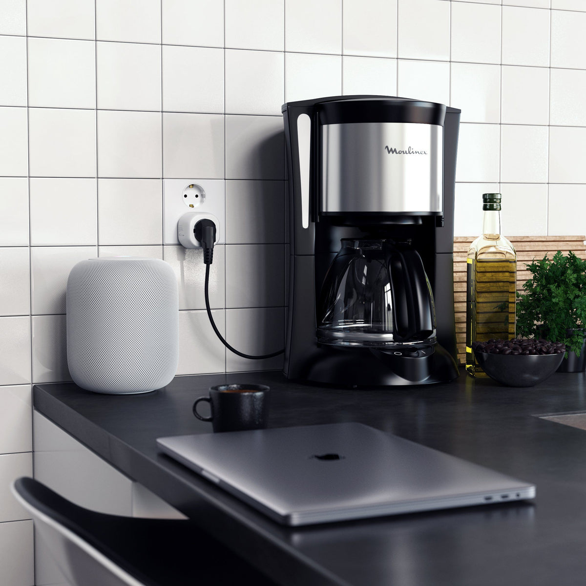 Satechi Smart Outlet (EU) plugged into a kitchen wall, powering a coffee maker