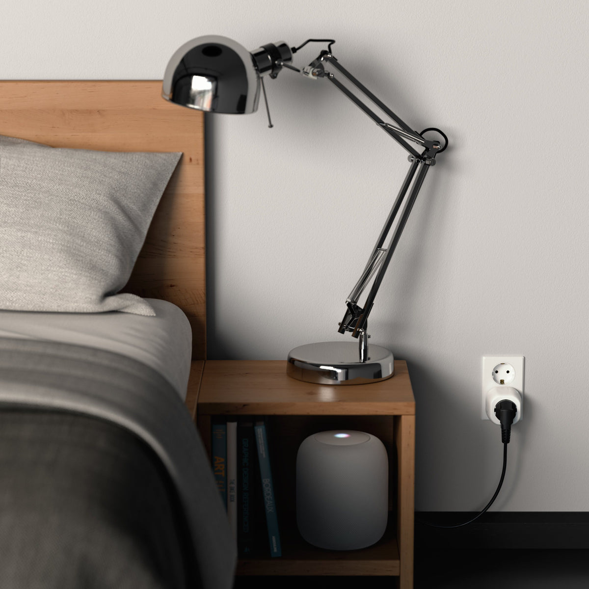 Smart Outlet (EU) plugged into a bedroom wall, powering a desk lamp