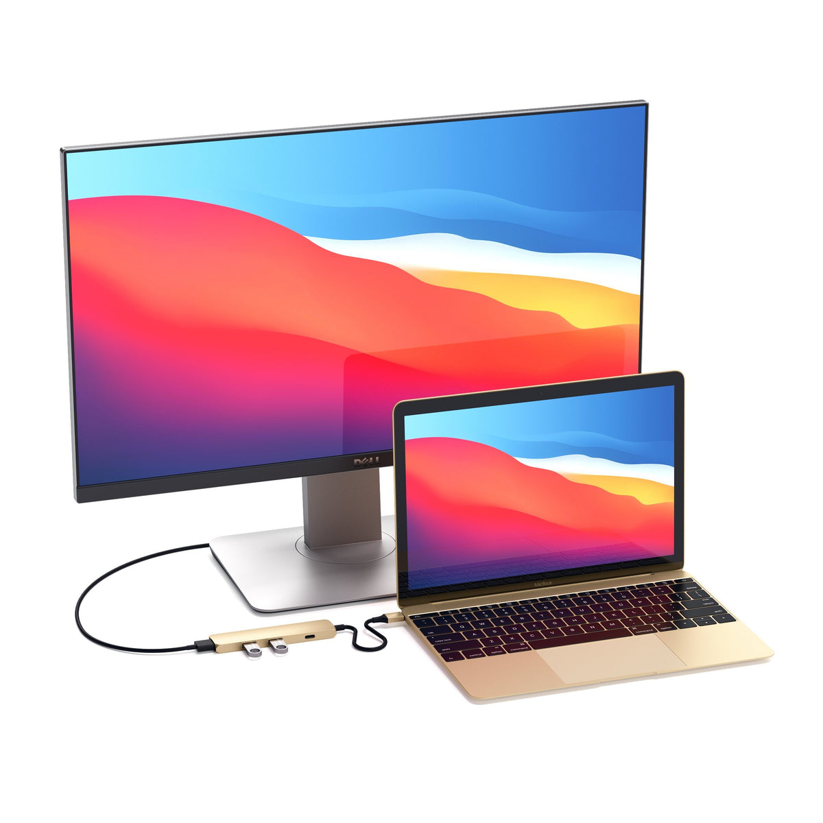 Type-C Slim Multi-Port Adapter 4K in Gold connecting a MacBook to an external monitor