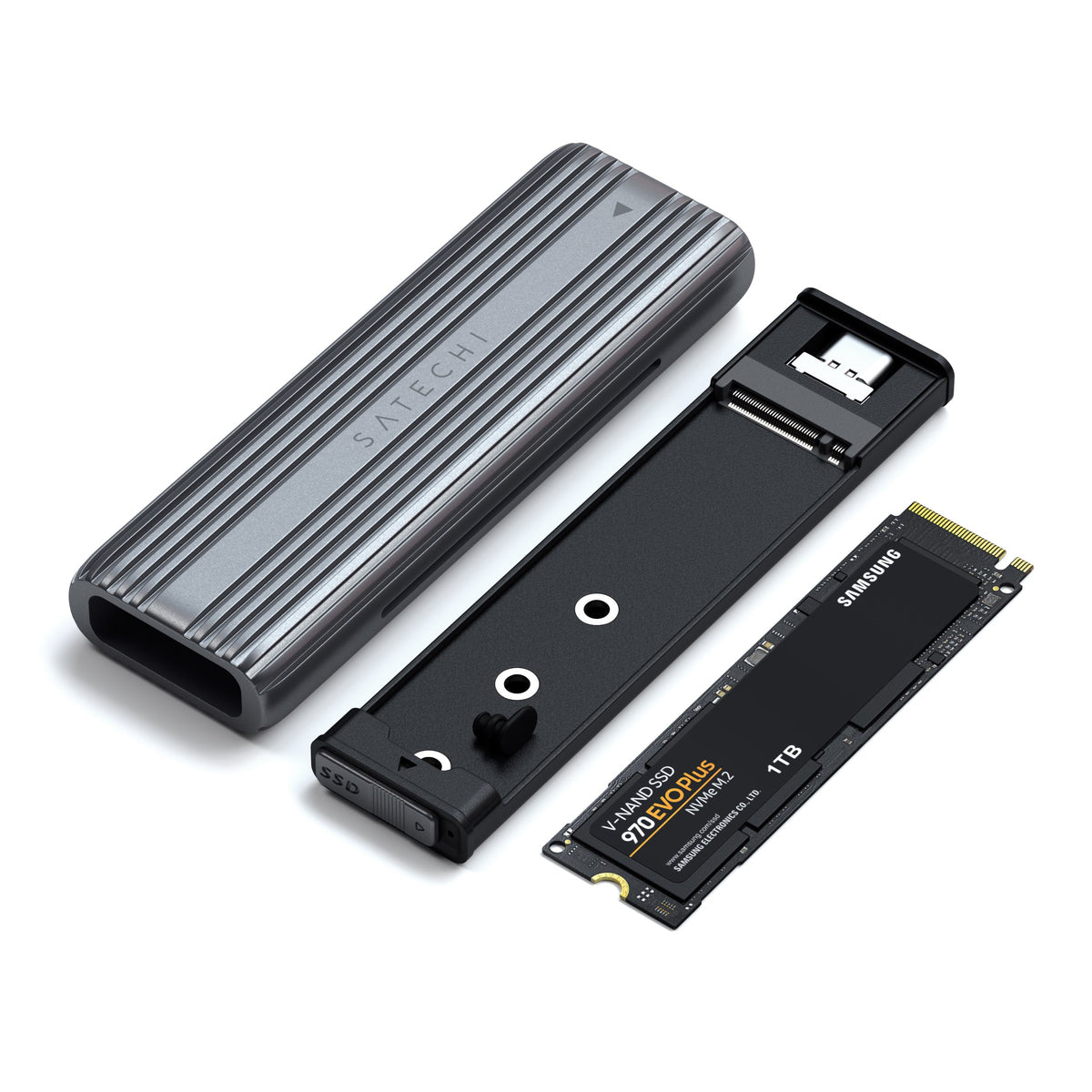 USB-C NVMe and SATA SSD Enclosure with the tray removed and an M.2 SSD beside it
