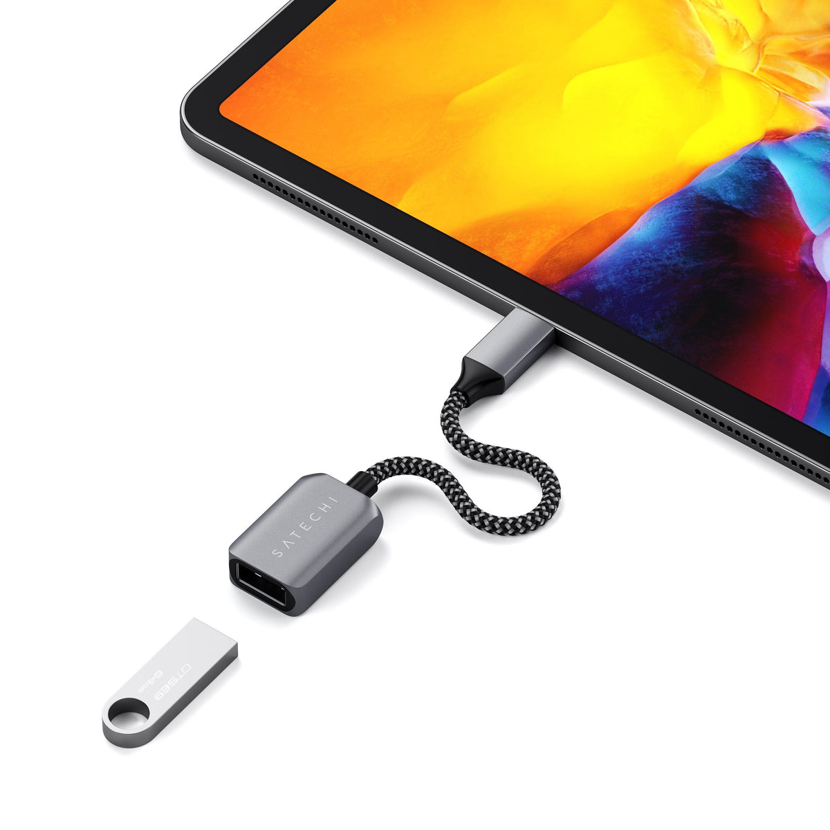 USB-C to USB 3.0 Adapter Cable connecting a USB flash drive to an iPad Pro