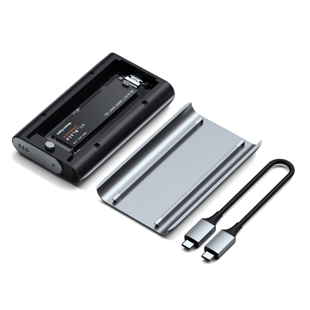 USB4 NVMe SSD Pro Enclosure opened, showing an NVMe SSD inside, removable cover and USB-C cable